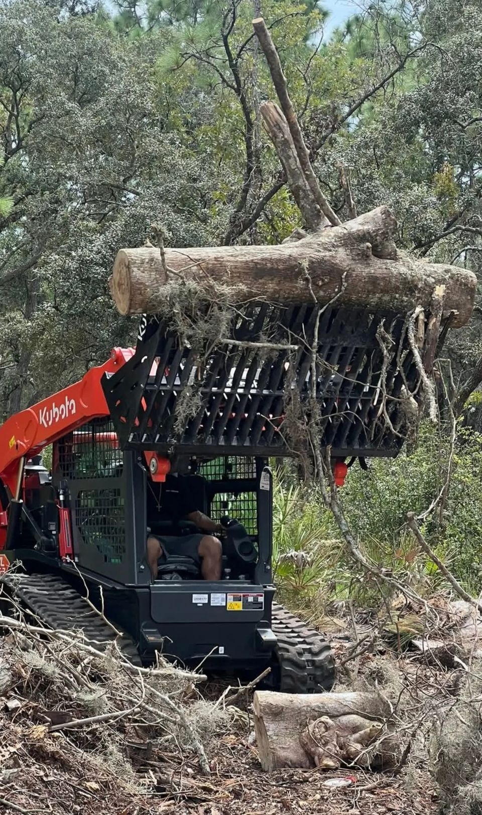 Land clearing using the Kubota, done by JNJ Hauling Solutions of Citrus County