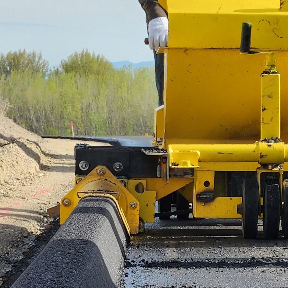 Asphalt curbing cropped more