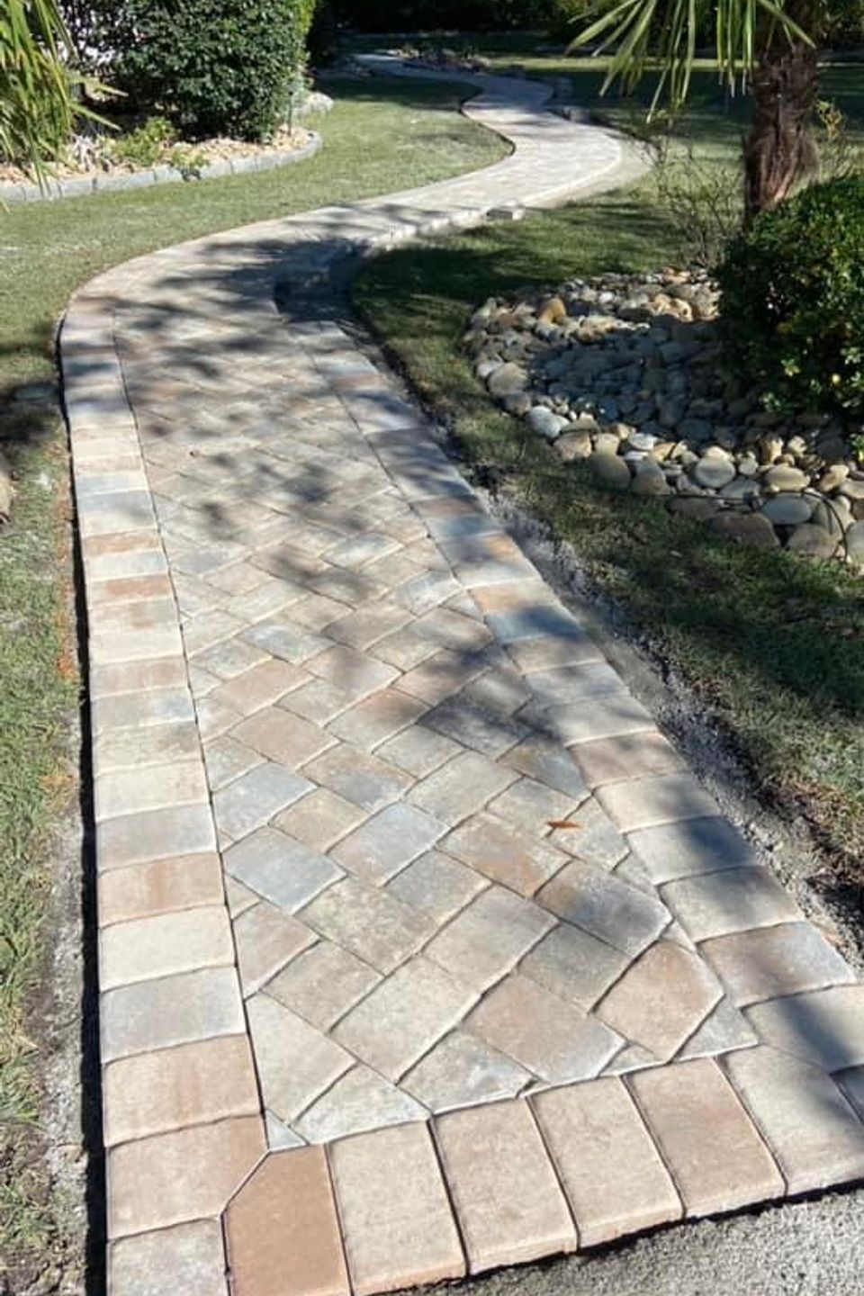 "Paver sidewalk constructed by Gabino Landscaping in Myrtle Beach, South Carolina."