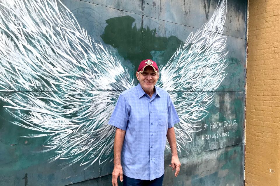 Wings and smiling guy