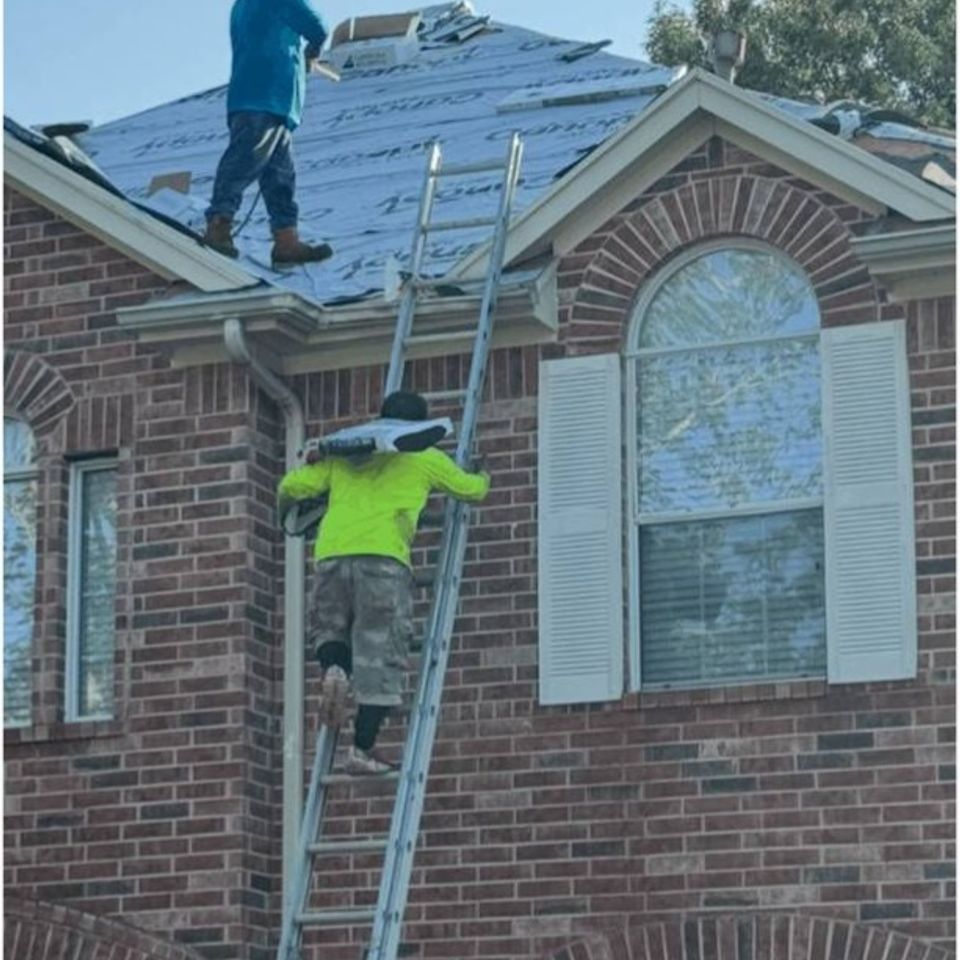 Roofing crew beginning residential roof replacement project in Spring Texas
