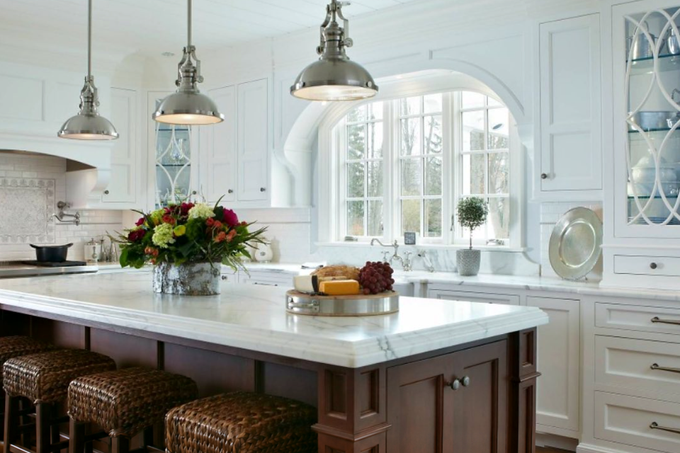 Luxury white kitchen dark wood island