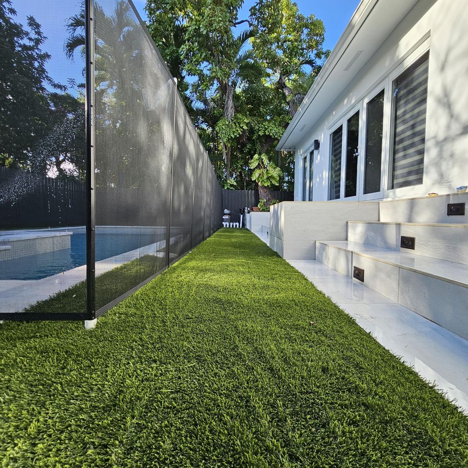 Close up of synthetic grass around pool area