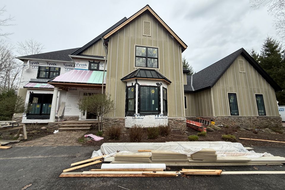 Exterior construction during Hudson home remodeling project
