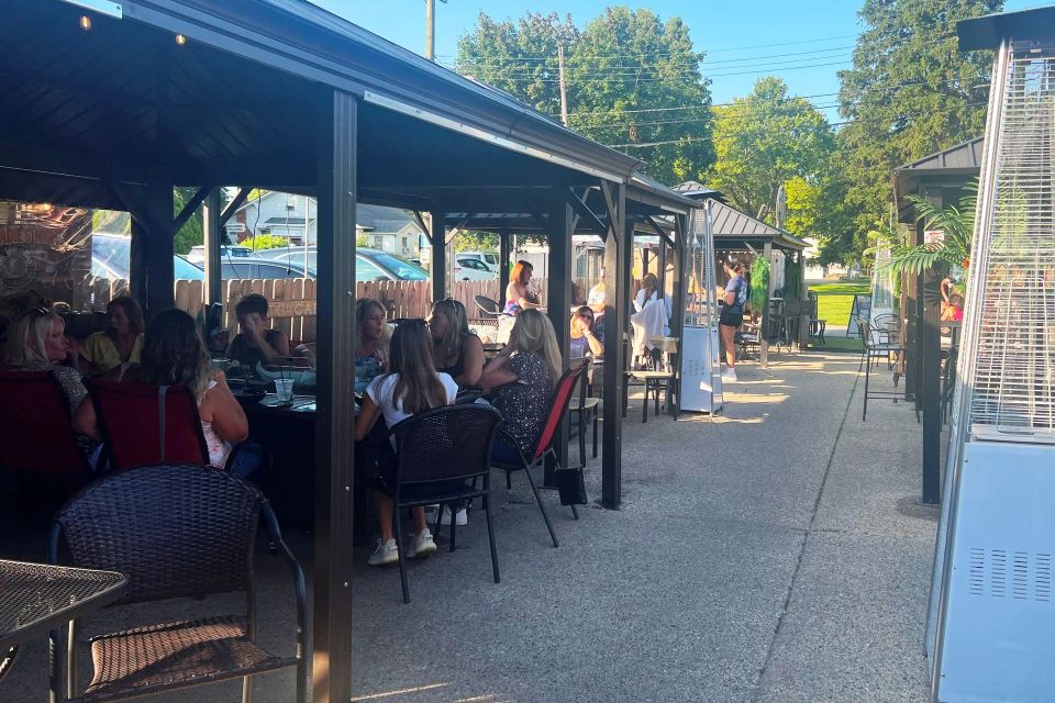 Outdoor dining at on the bay cafe courtyard new baltimore michigan 24 1920w