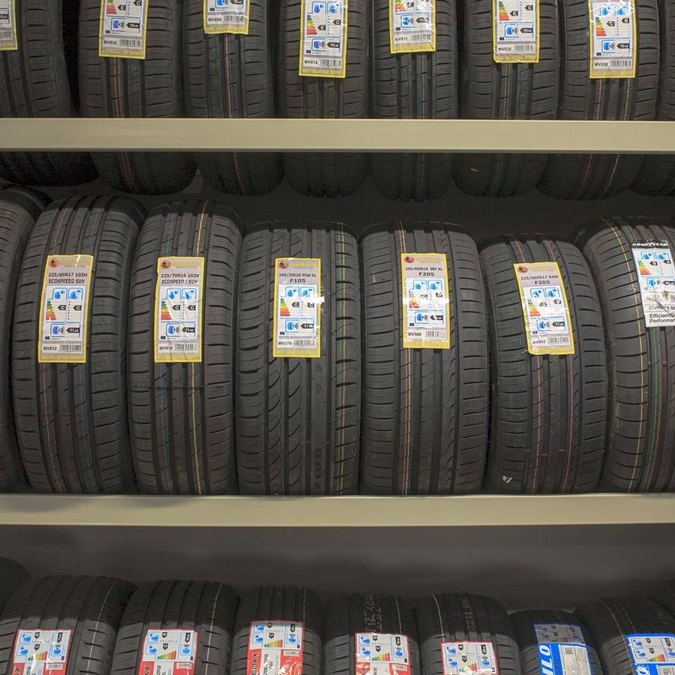 Image of tires on display shelves.