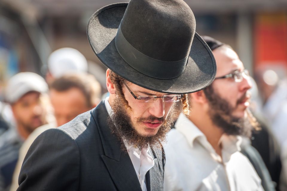 Pilgrims of Hasidim in traditional festive attire