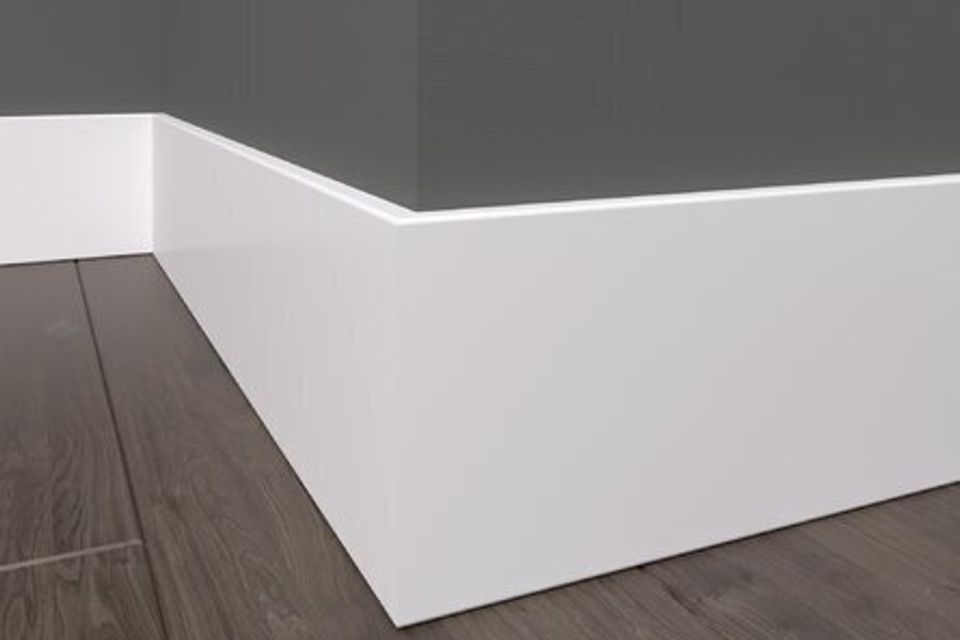 Engineered wood 0.87" thick x 5.25" wide x 96" length wall base in white