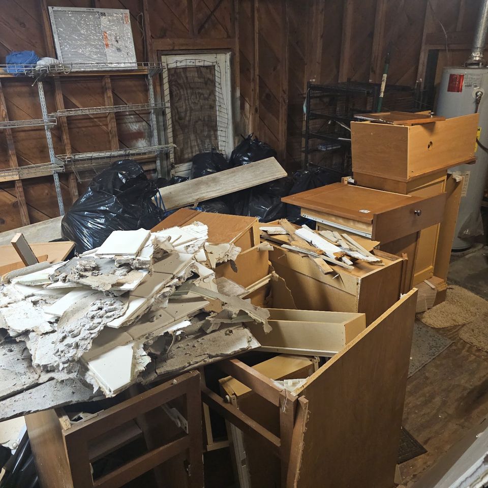 A shed/garage filled with junk.