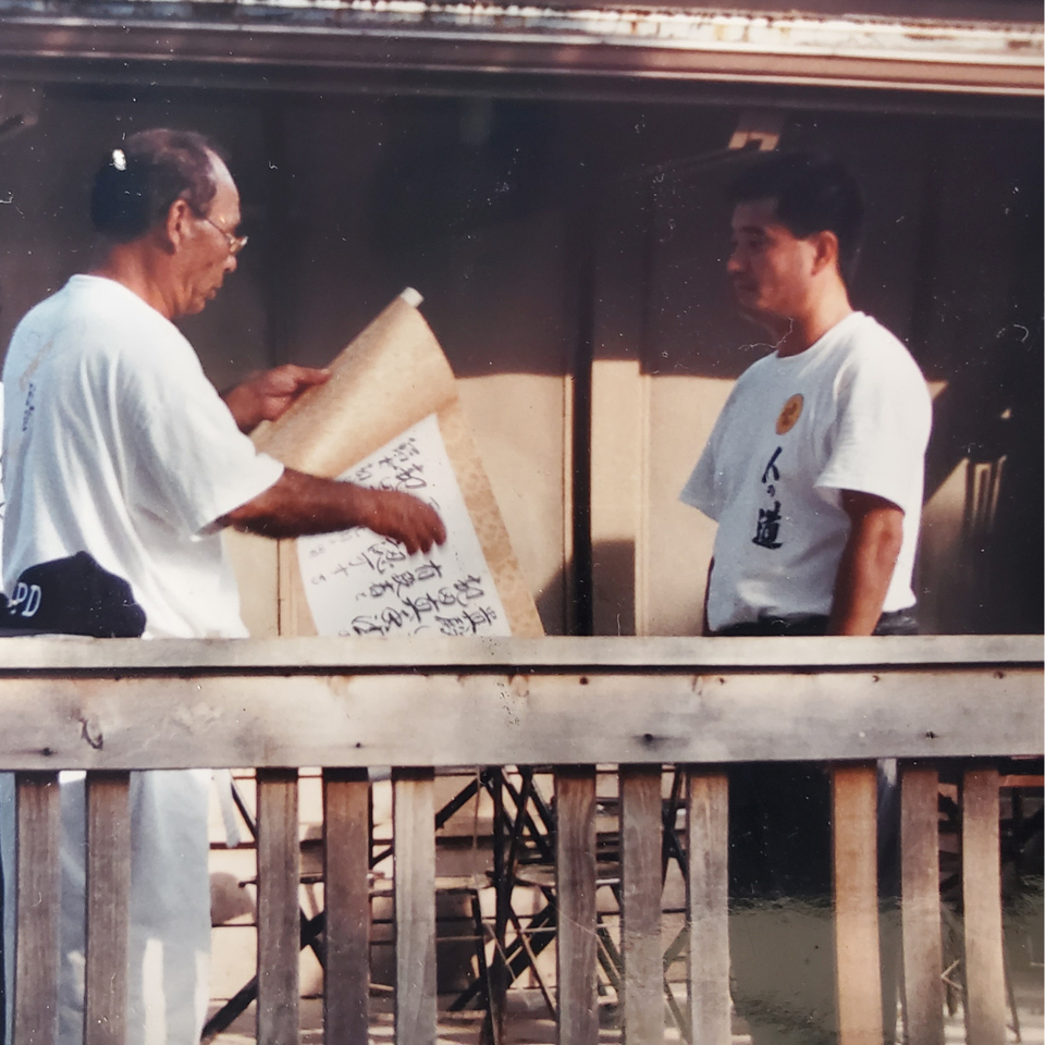 Hanshi Seiken Takamine getting promoted by Taika Seiyu Oyata