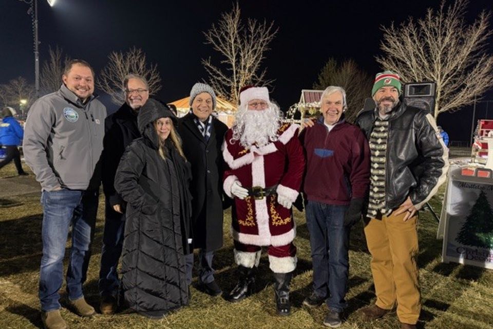 Andrew chuck mary joe santa greg and ralph at the mistletoe market 2025