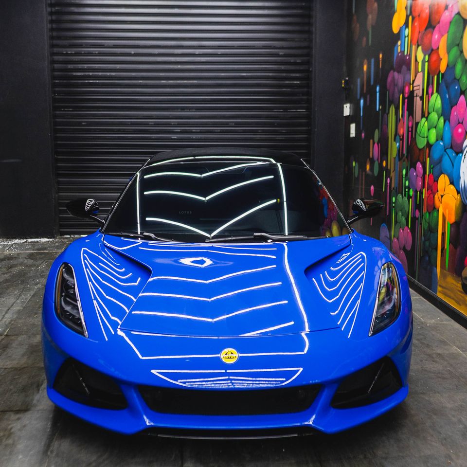 Professionally detailed blue Porsche sports car