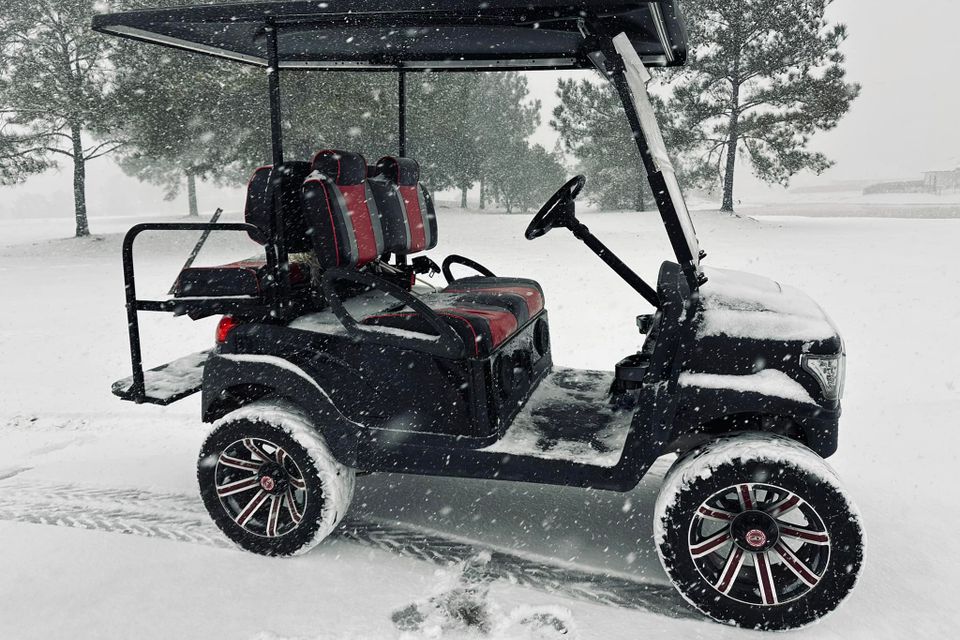 Golf cart covered in snow during January 2025 snowstorm in Metairie, LA