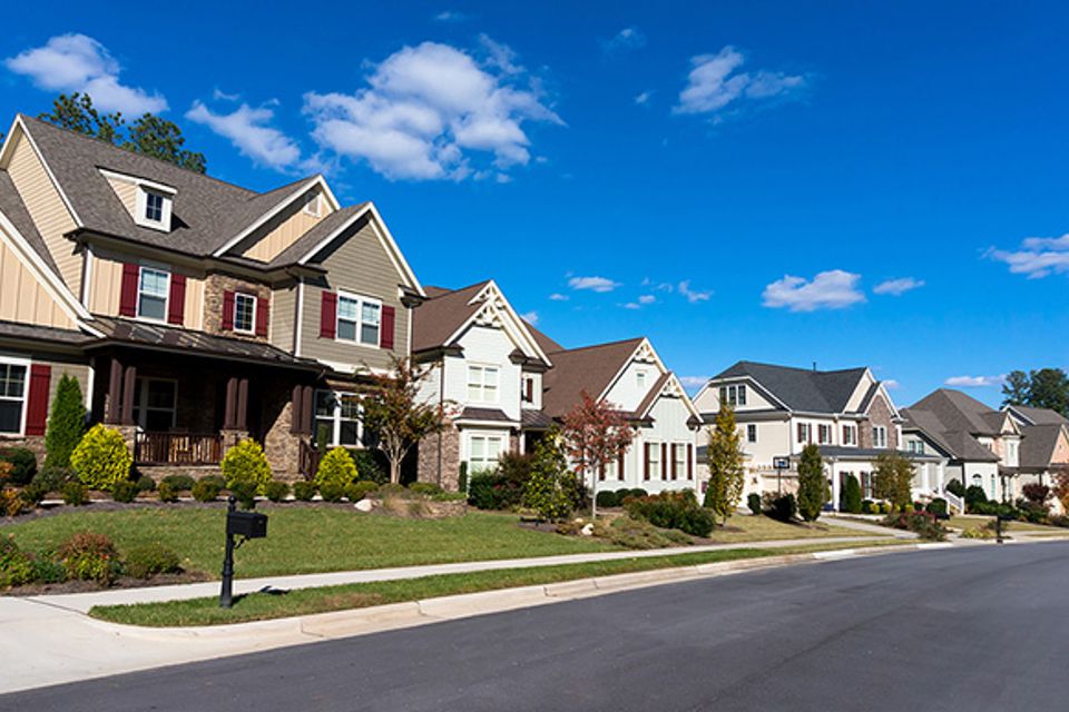 Bigstock street of large suburban homes 54135056