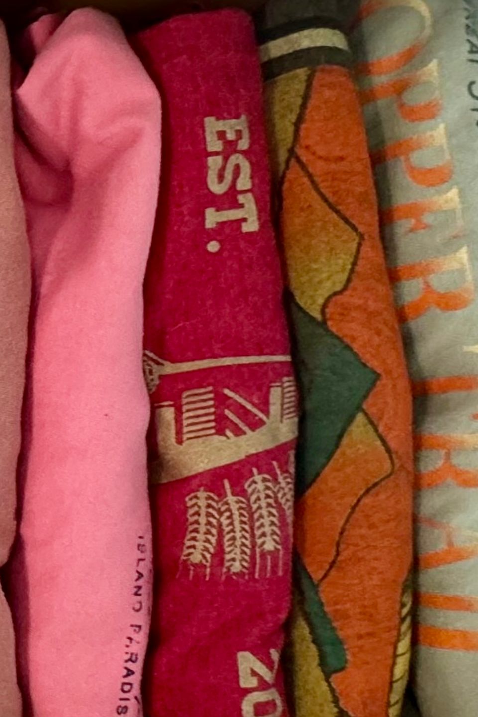 folded and packed clothing shirts