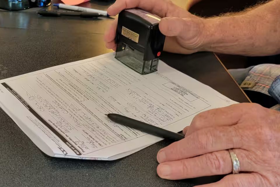 Notary service at md tag and title