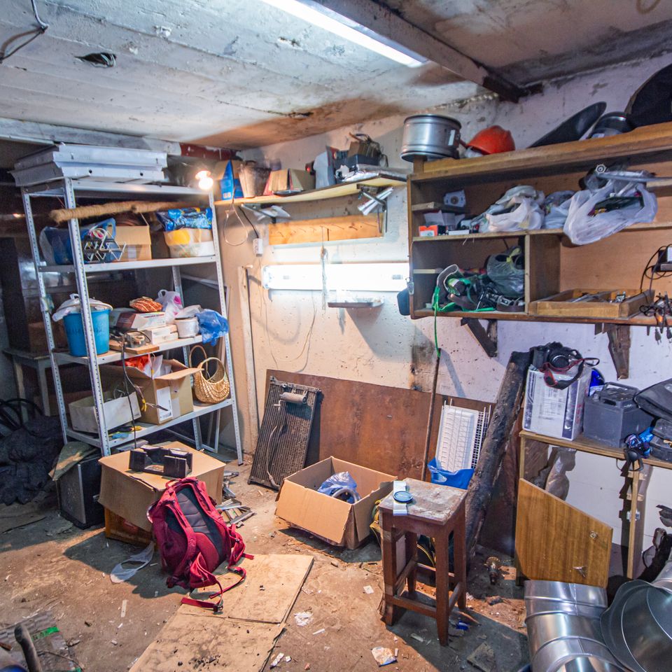 A big mess in the garage from rubbish