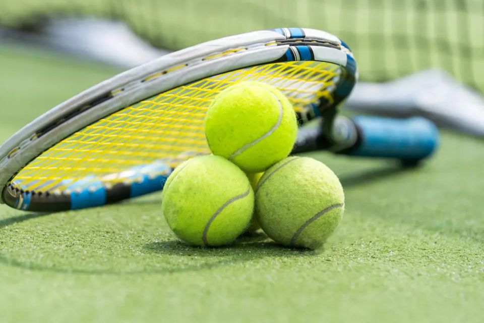 Vistacreate 733487750 stock photo macro tennis ball racket hard court blurry net background high (1)