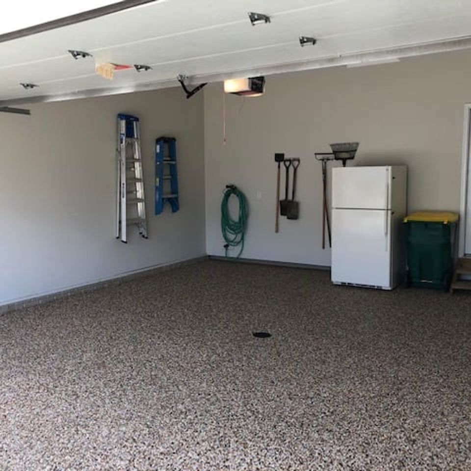 Residential garage with EverStone Epoxy Stone flooring.