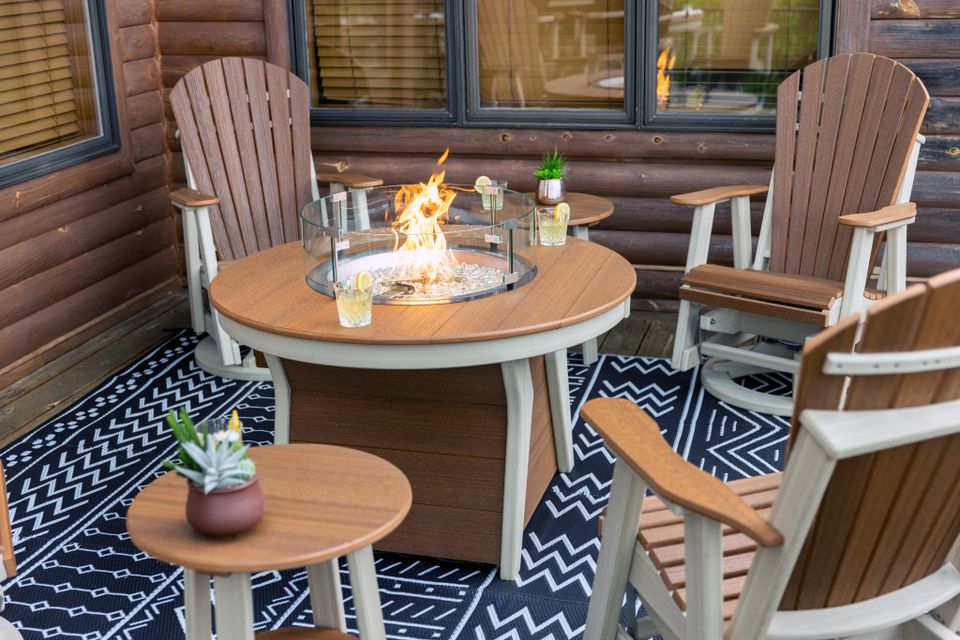 Hostetler comfy back swivel gliders with round dining fire table 