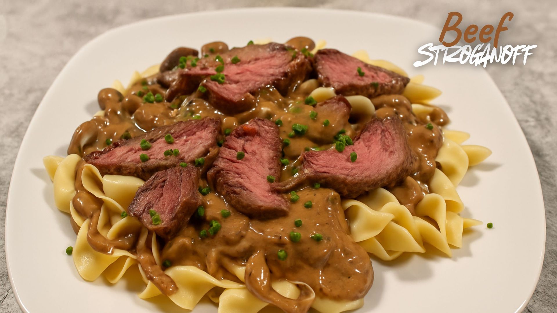 Tender beef stroganoff with sour cream gravy over egg noodles – BeSureToCook
