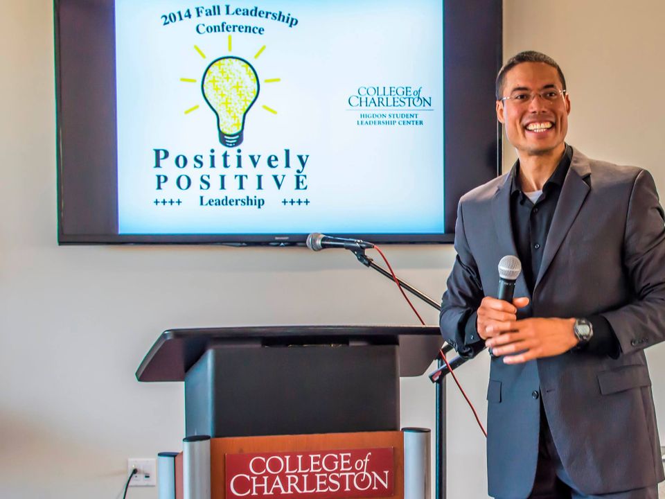 Action shot motivational presentation speaking college student leadership conference