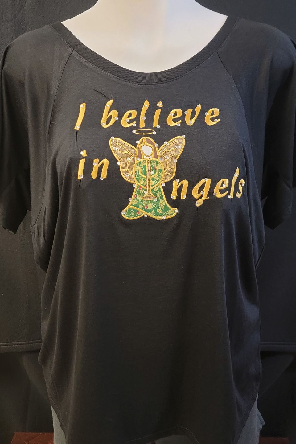 "I believe in Angels" Christmas t-shirt designed by SaRi's Creations using Direct to Film (DTF) technique. 