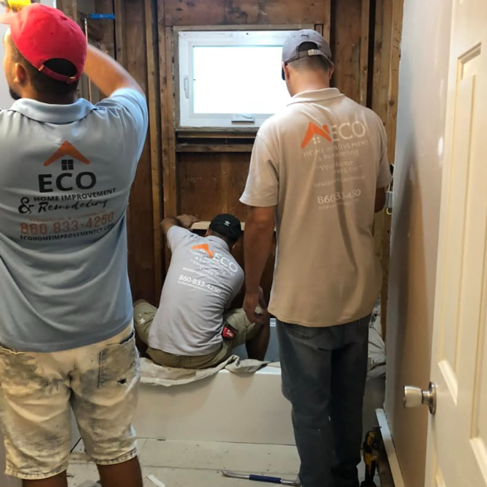 Bathroom remodeling crew at work