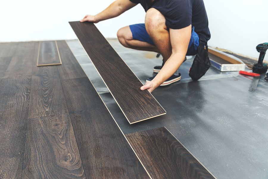 Bigstock laminate flooring  worker ins 263408857