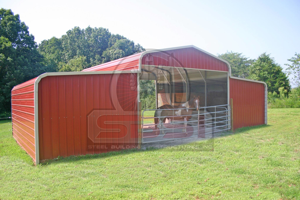 Red steel barn with open center shelter and horses inside with SBSI watermark representing steel barns in Alabama