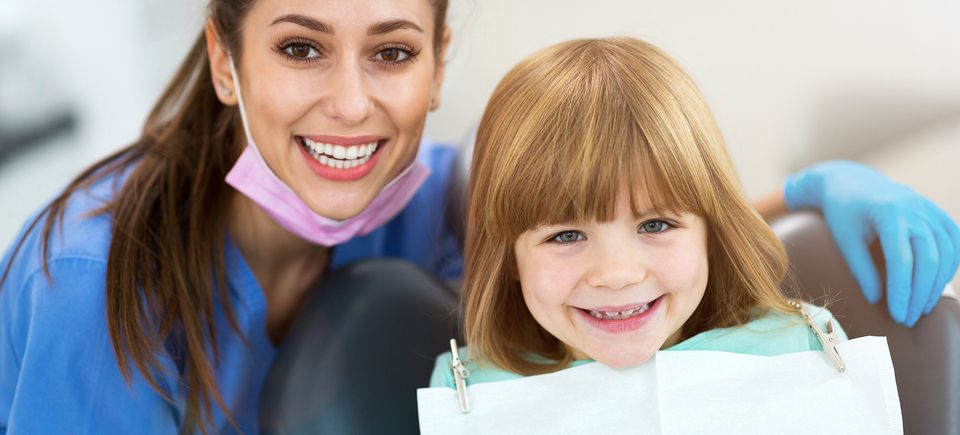 Bigstock female dentist and child in a  270212134
