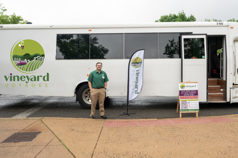 Tour guider welcoming visitors for a vineyard tour