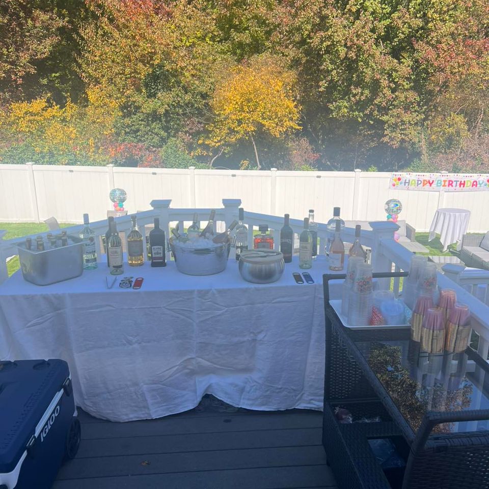 alt="The Party Savers staff bartending and waitressing at a Long Island Birthday Party"