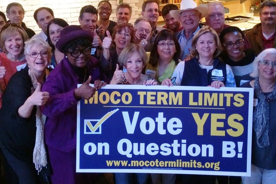 Term limits victory with sign   11 2016