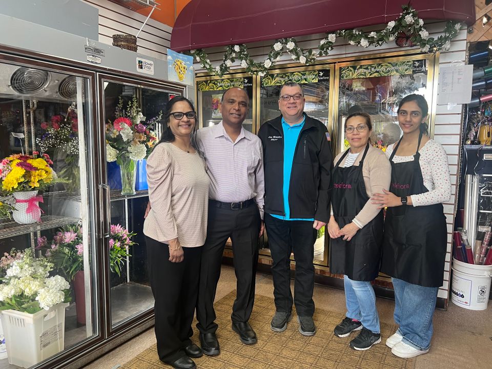Flowers by trish raj and renuka bussety   mayor joe nicastro  binai rawal and miriam  turcios 