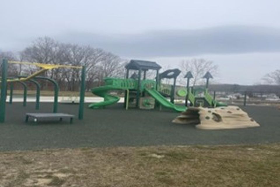 Photo of the Upgraded Chauncey Community Park, featuring a pump track, playground, restroom facility, basketball court, pavilion, and more