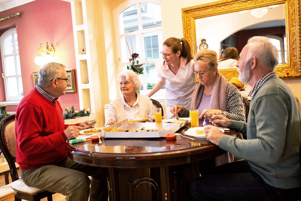 Bigstock nurse serving retirement home  284106454