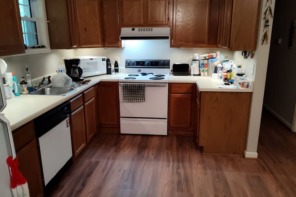 Finished kitchen re face  installing floating floor with base shoe tj