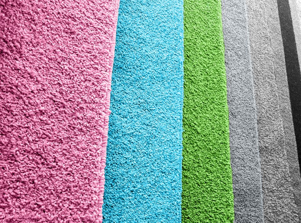 Different colors of carpets together