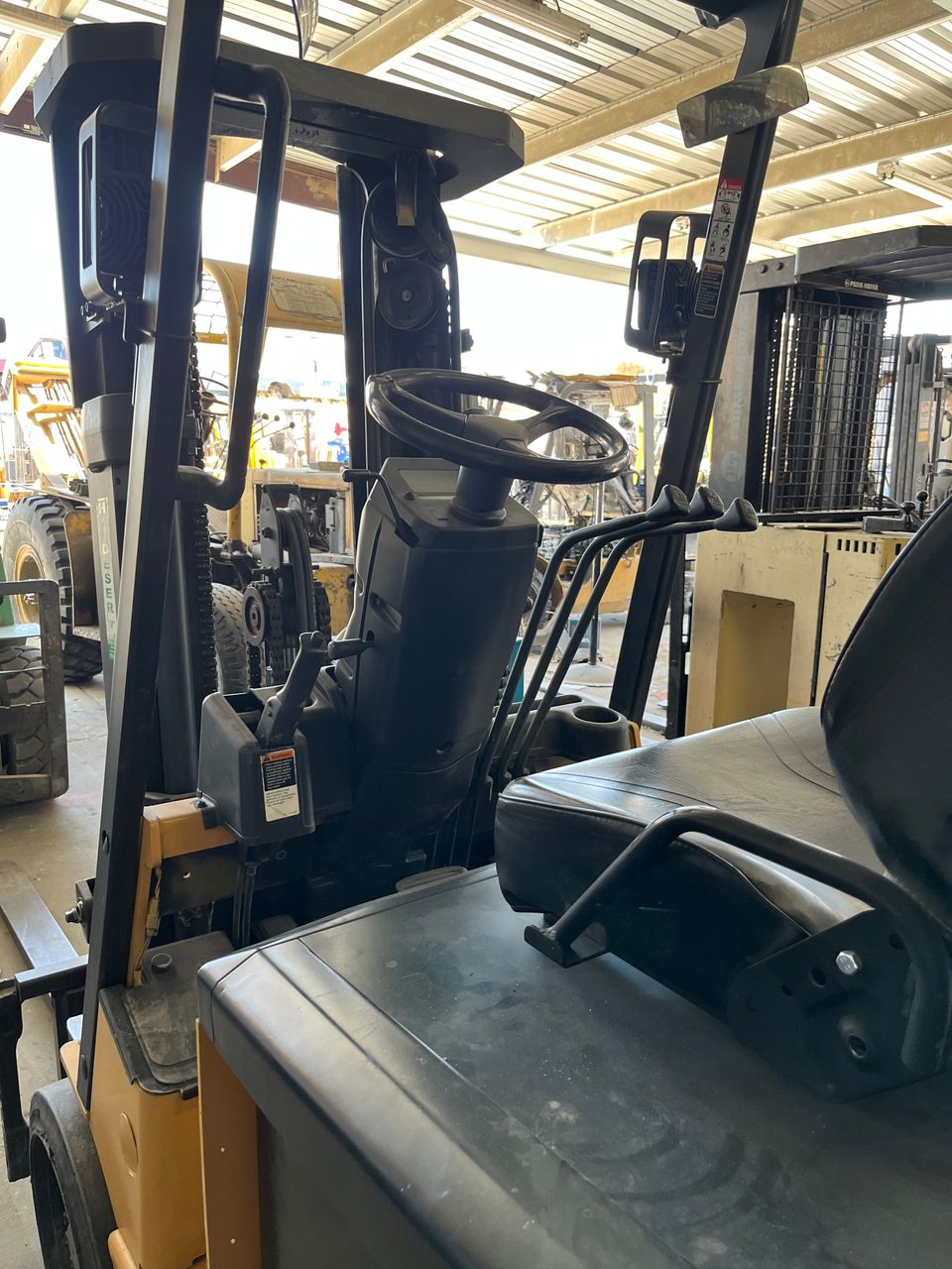Image of a forklift cockpit and controls