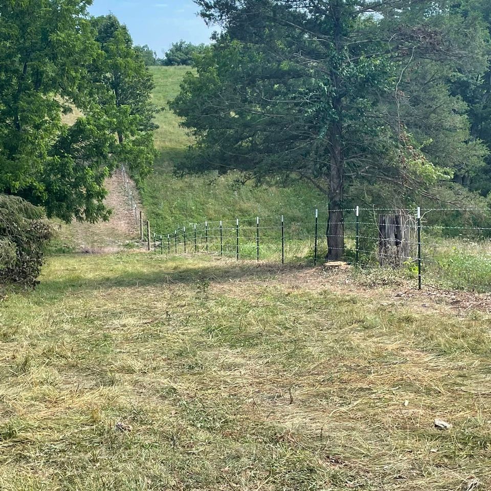 barbed wire farm fence repair or replacement