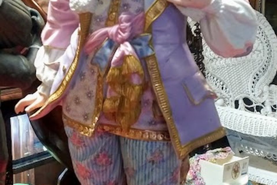 Porcelin doll statue restored