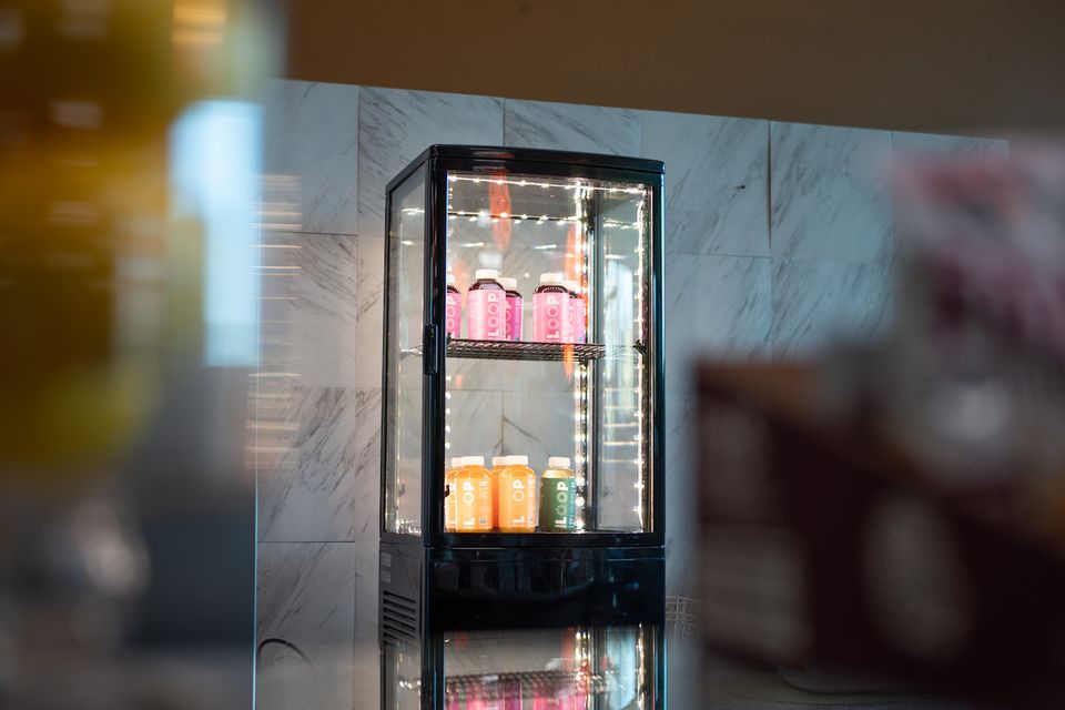 A small refrigerator behind the smoothie bar at Maximus Gym in Riverhead