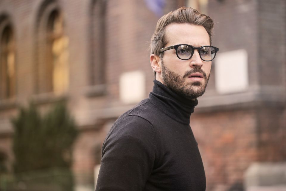 Stylish guy with shaded glasses after his eye exam