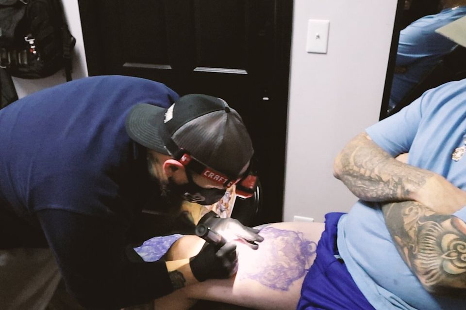 Josh tattooing