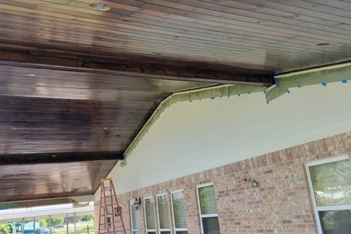 Fresh stain brings warmth to a pine patio ceiling in Montgomery, TX