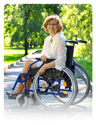 Woman outside in the park in wheelchair