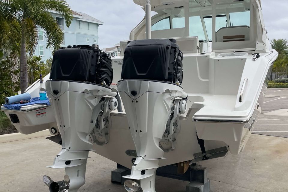 A boat while maintenance is being performed on the two motors