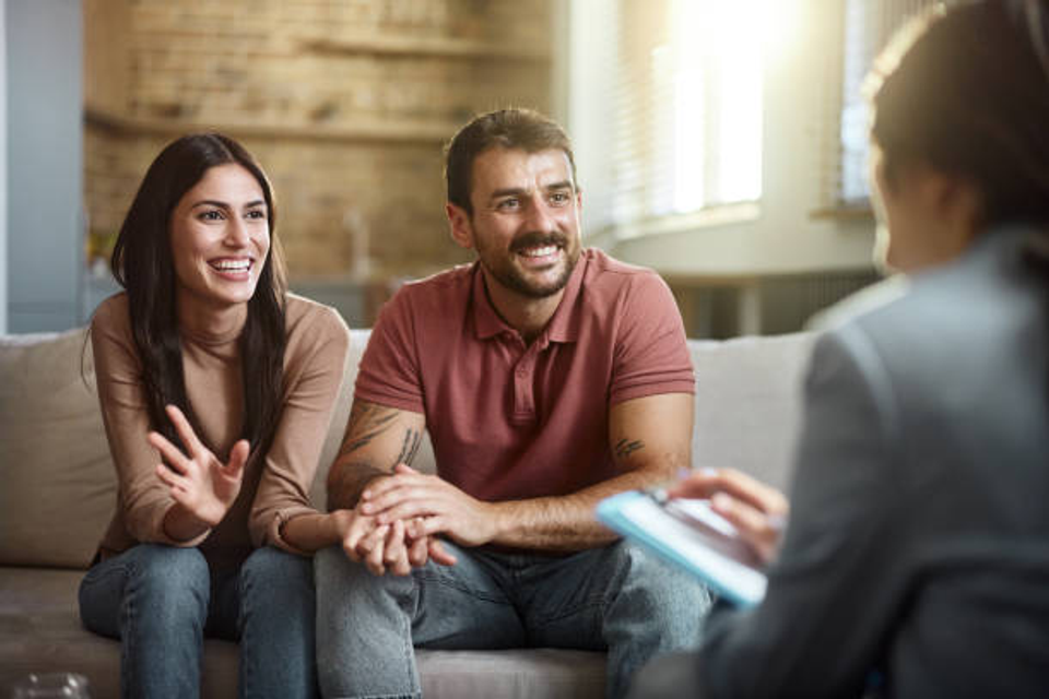 Couple sitting together during a therapy session, working on relationship communication