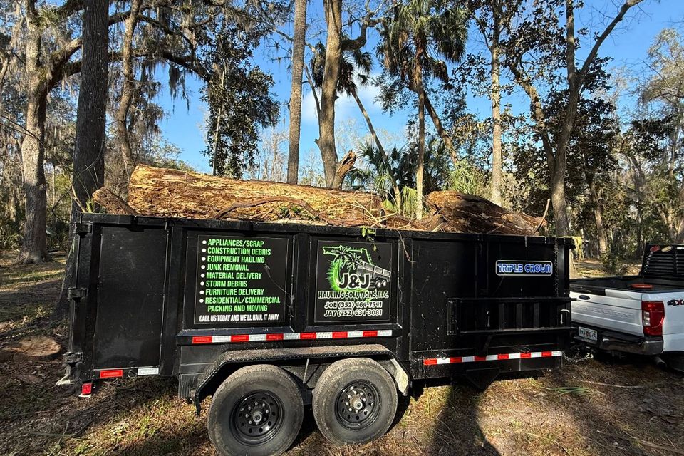 A full trailer of tree stumps, done by JNJ Hauling Solutions of Citrus County